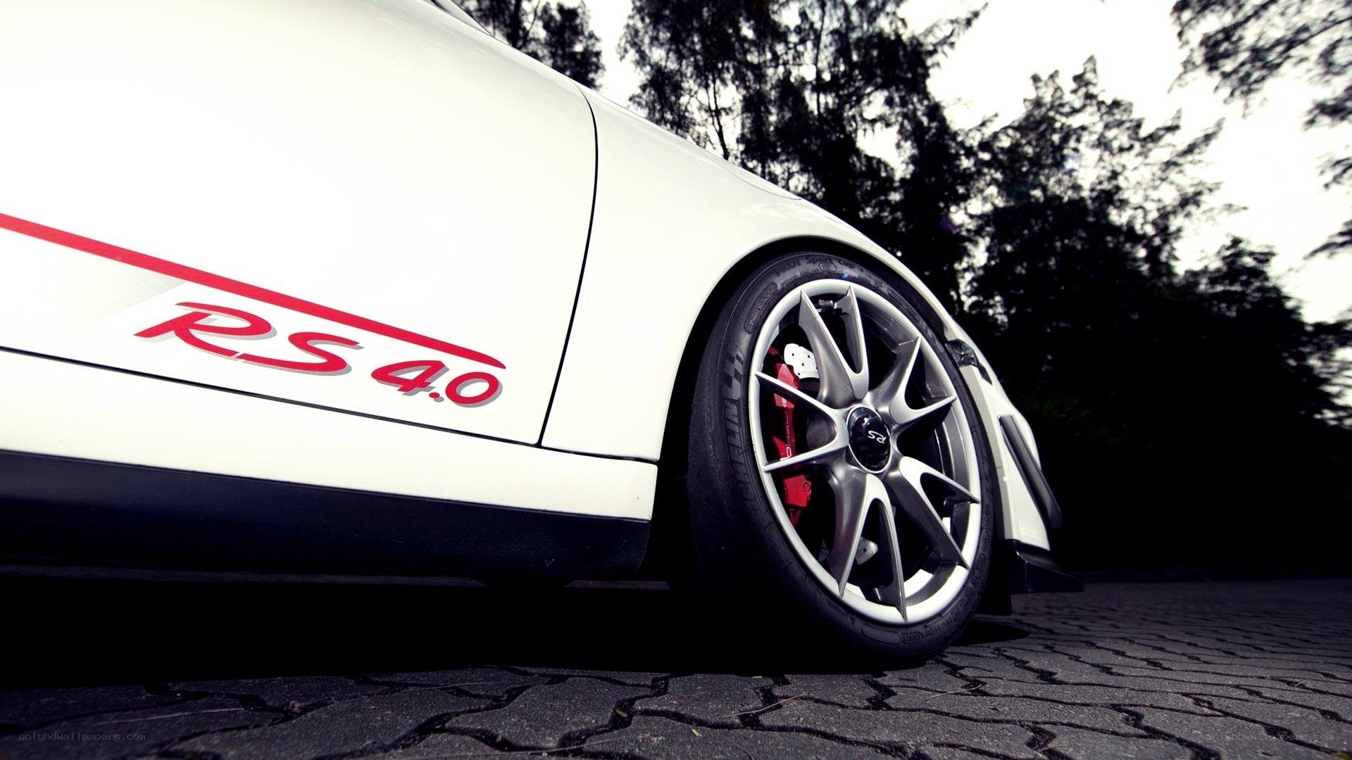 White Porsche RS 4.0 car