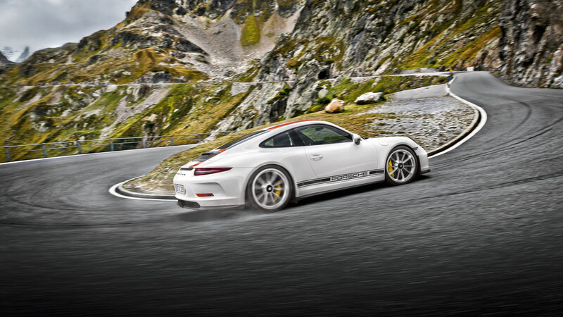 White Porsche Sports Car — Dynamic, Photograph, Mountain Road