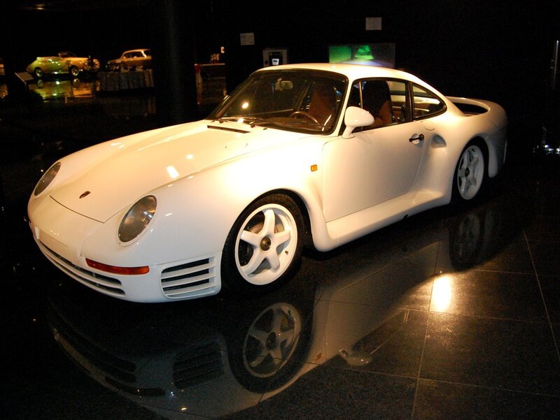 White Porsche sports car on display