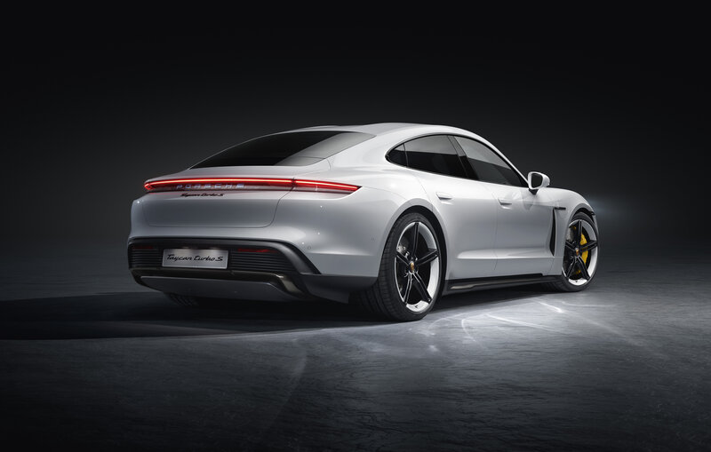 White Porsche Taycan — Dramatic, Photograph