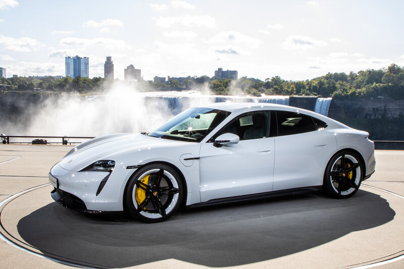 White Porsche Taycan — Dramatic