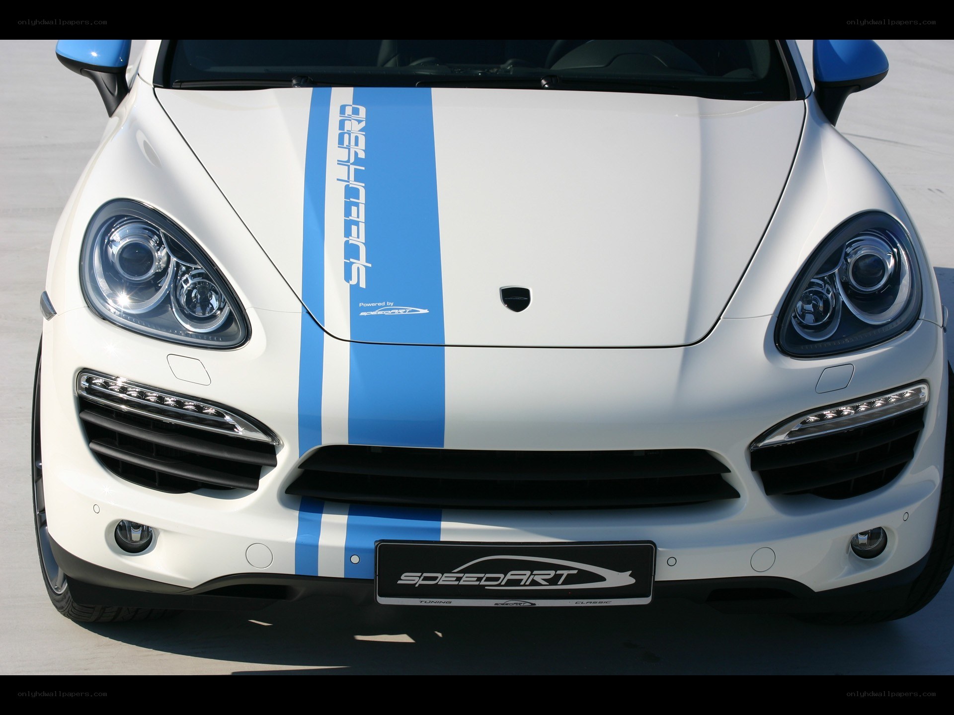white porsche with blue stripes