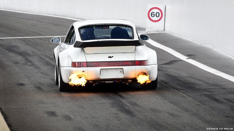 White Porsche with flames