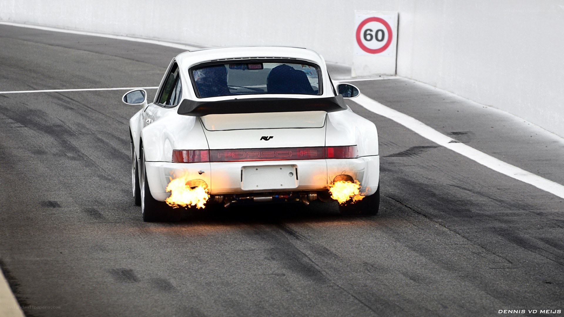 White Porsche with flames