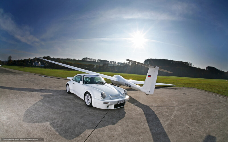 White Porsche with glider
