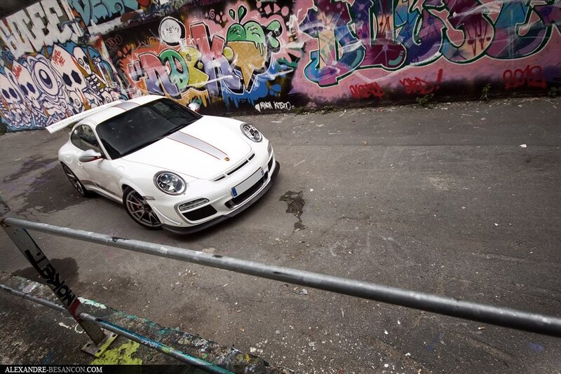 White Porsche with graffiti background