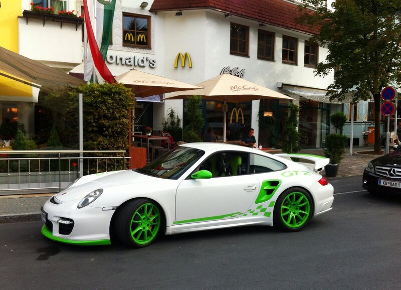 White Porsche with green accents
