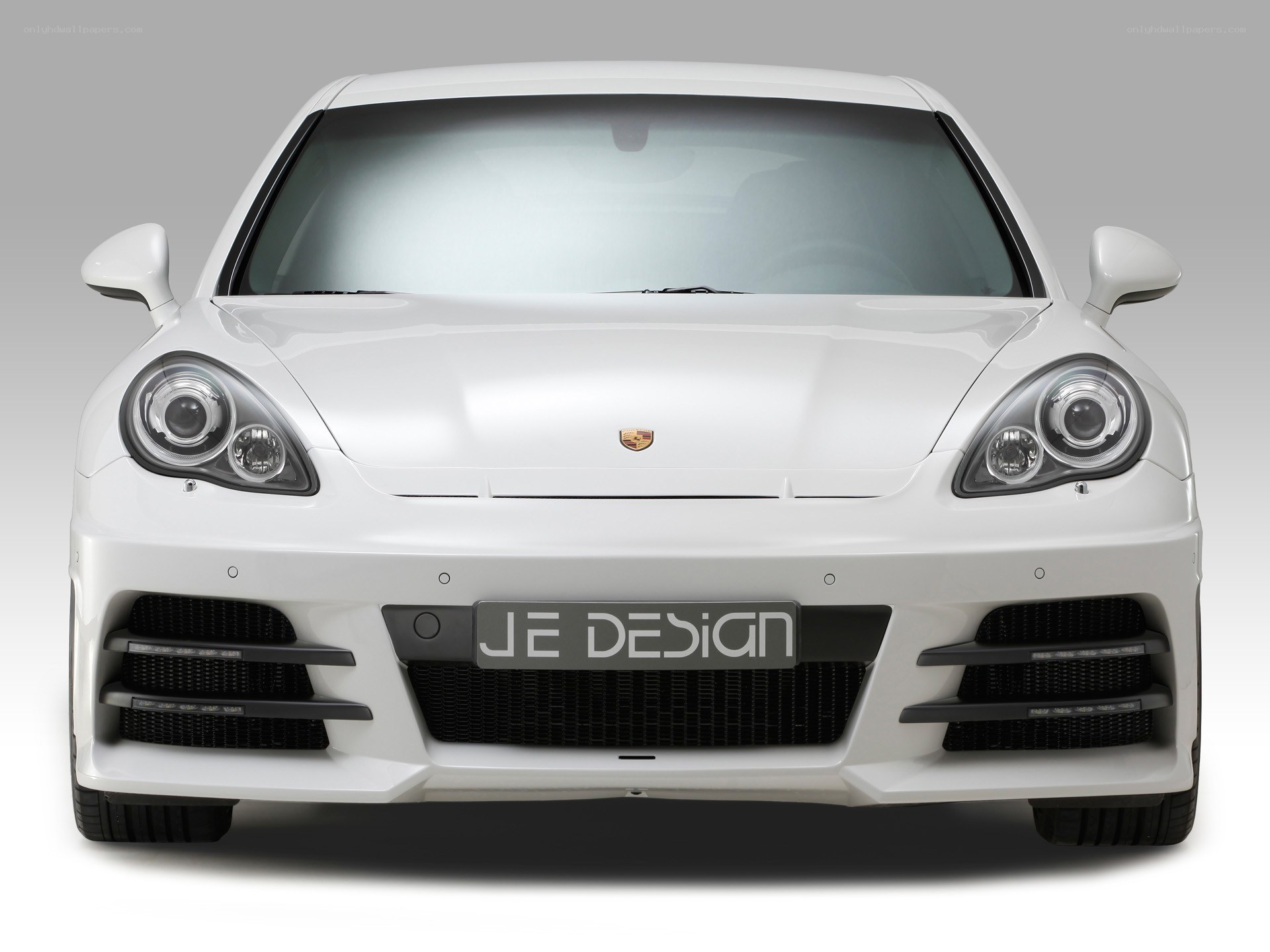 white porsche with je design front