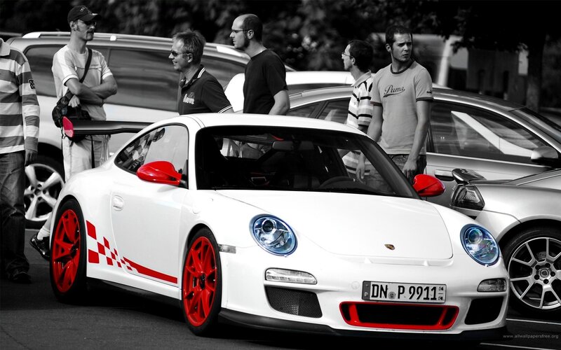 White Porsche with red accents