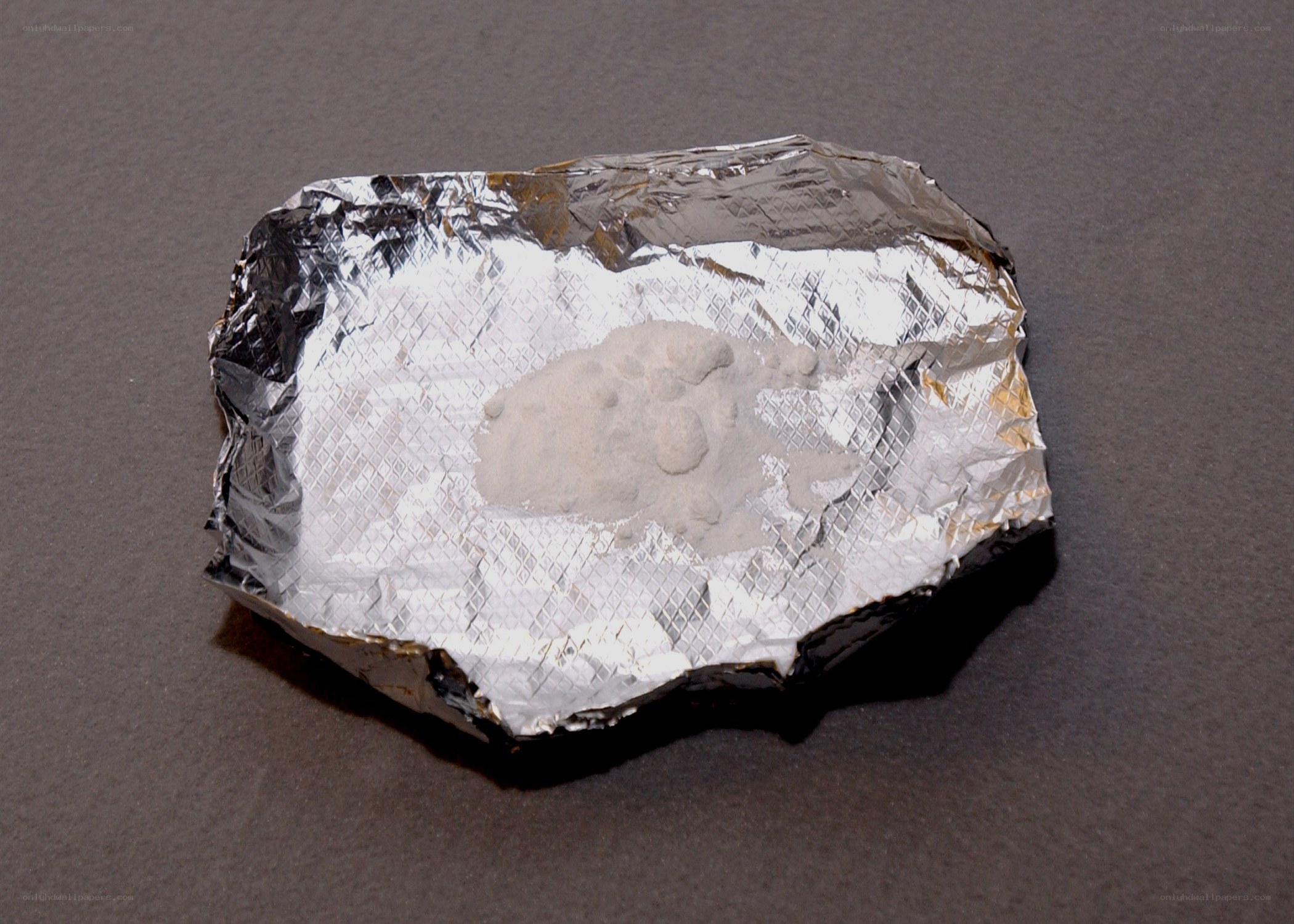 white powder on foil