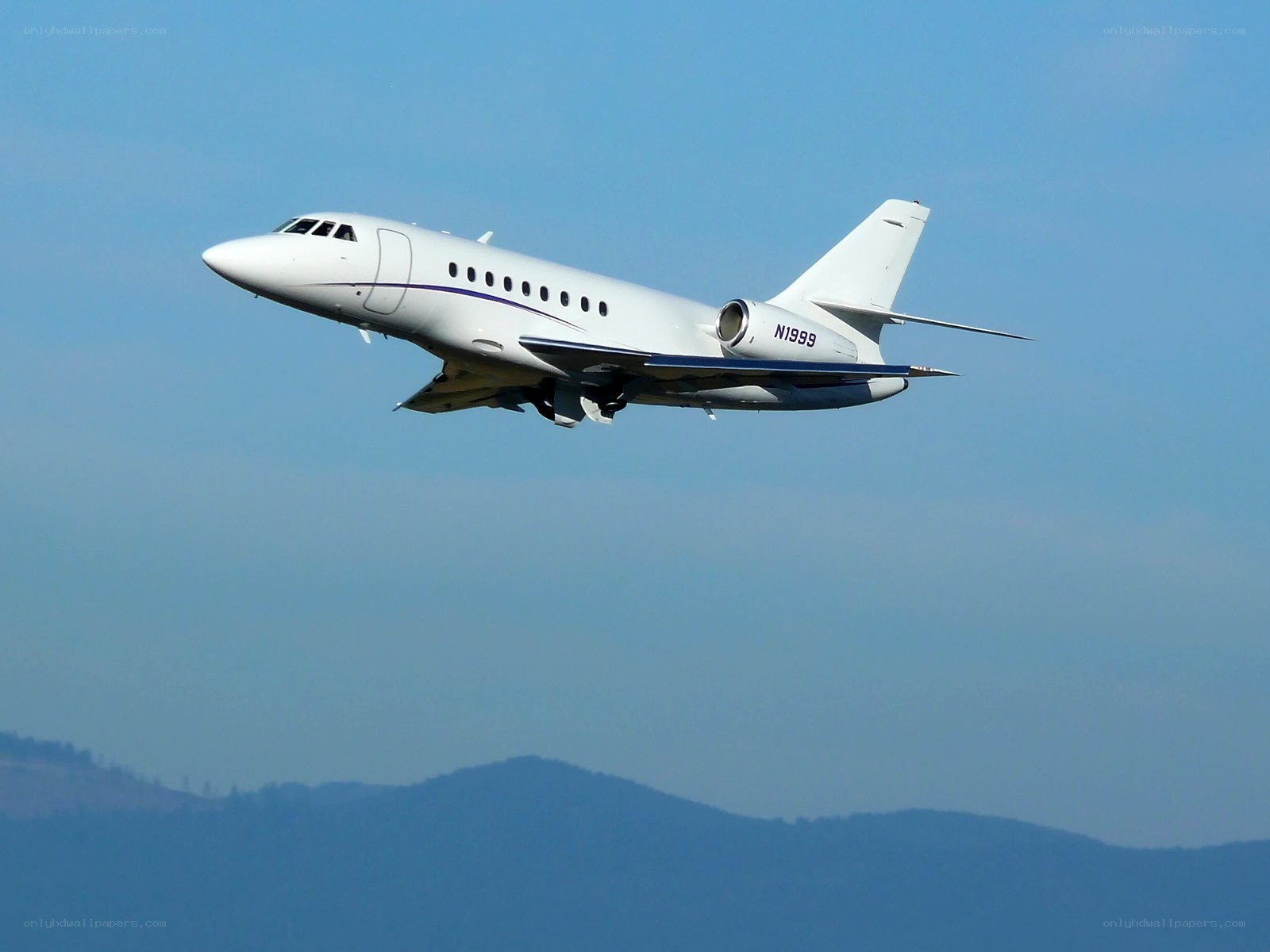 white private jet in flight