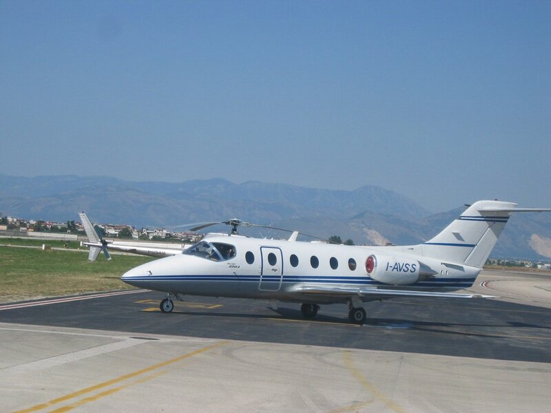 White Private Jet on Tarmac — Calm