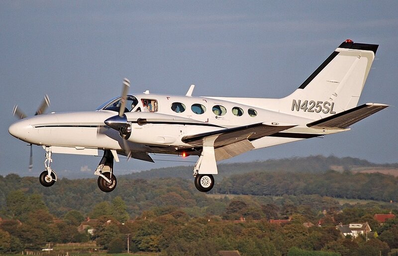 White Propeller Airplane — Calm, Afternoon, Photograph