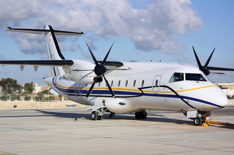 White Propeller Airplane — Calm, Afternoon