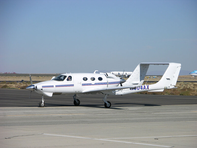 White Propeller Airplane — Calm