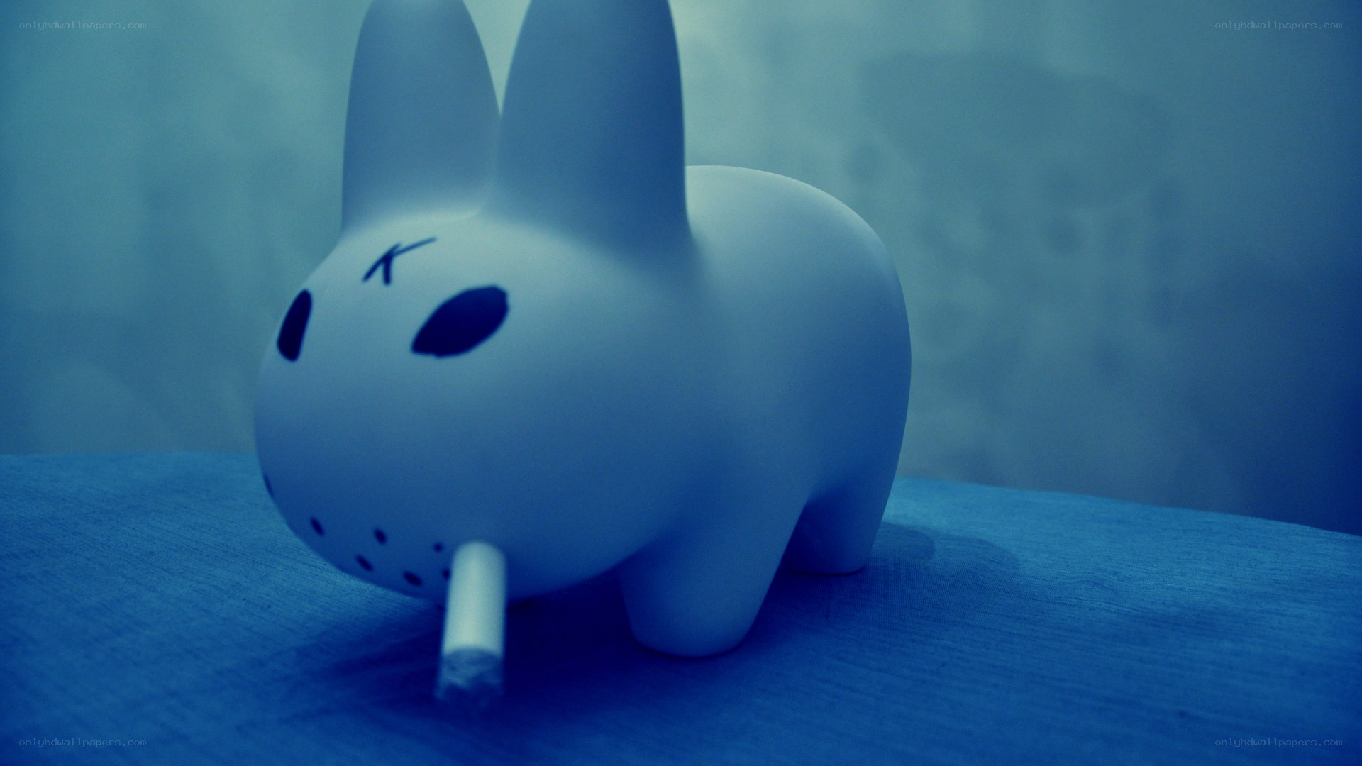 white rabbit figurine with cigarette