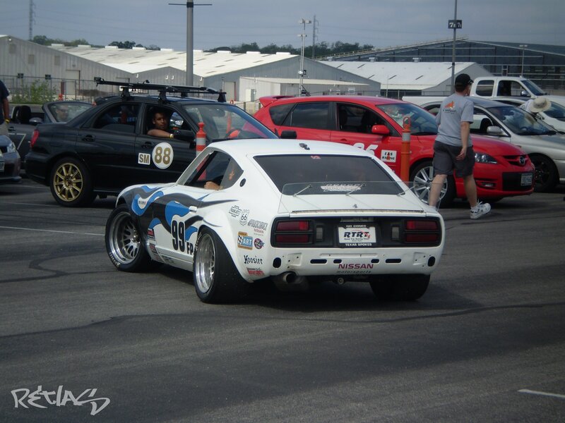 White race car at a track day