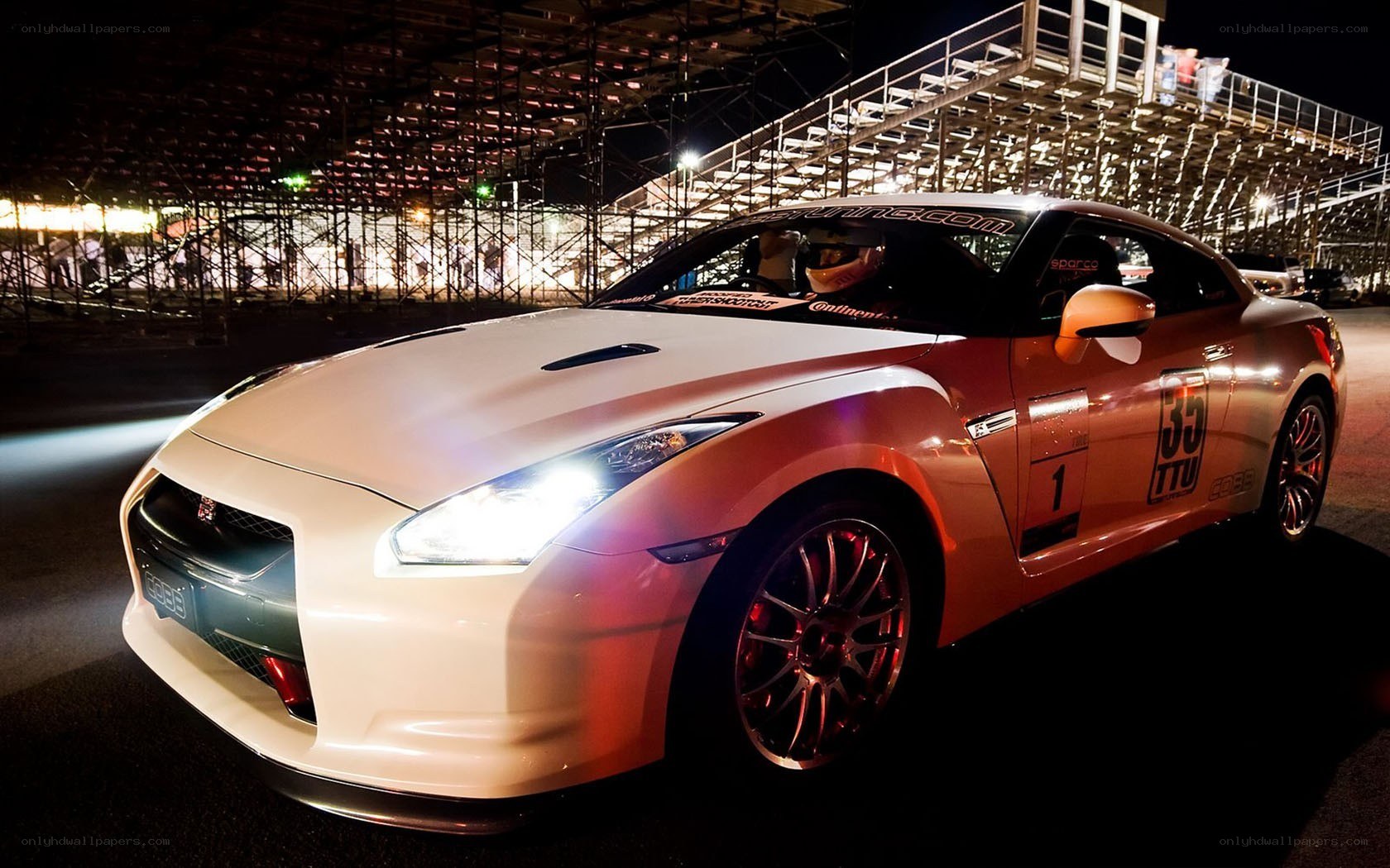 White race car at night
