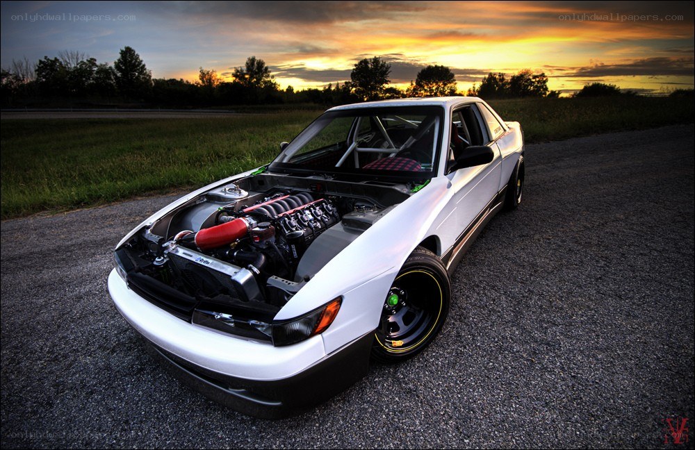 white race car at sunset