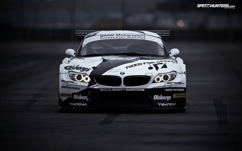 White Race Car — Black, Dramatic, Night, Photograph, Race Track, Headlights, Sponsors