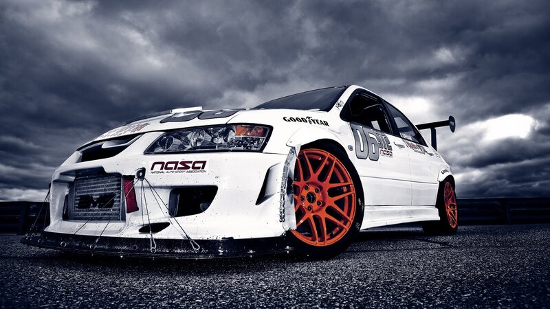 White Race Car — Dramatic, Photograph, Cloudy Sky