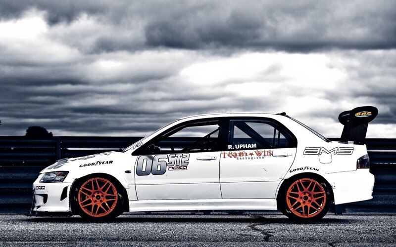White Race Car — Dramatic, Photograph, Cloudy Sky, Tire