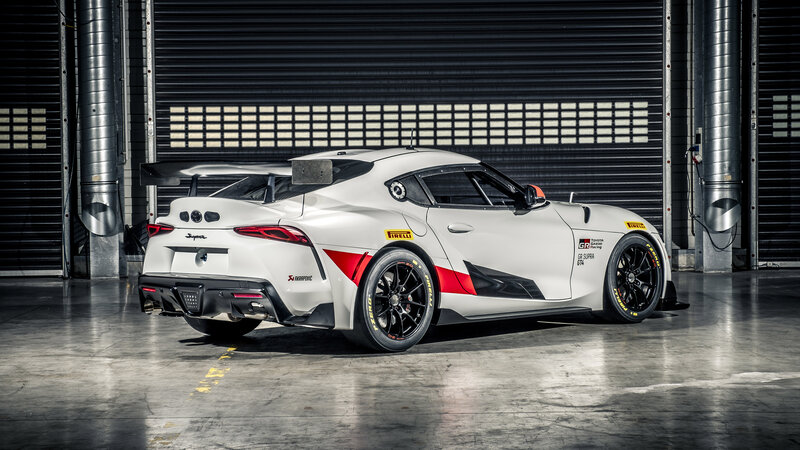 White Race Car — Dramatic, Photograph, Garage, Tires