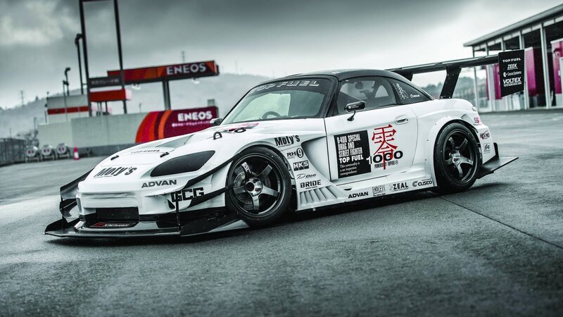 White Race Car — Dramatic, Photograph, Race Track, Gas Station, Tire