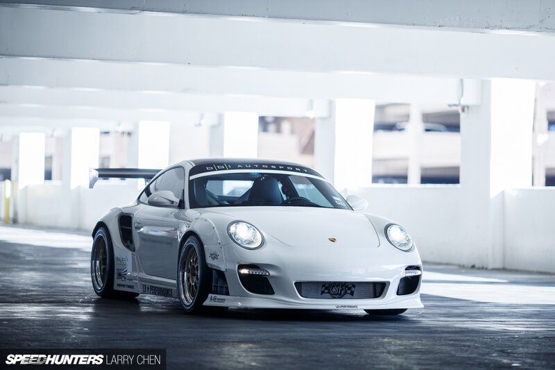 White Race Car — Dramatic, Photograph, Tire, Parking Garage