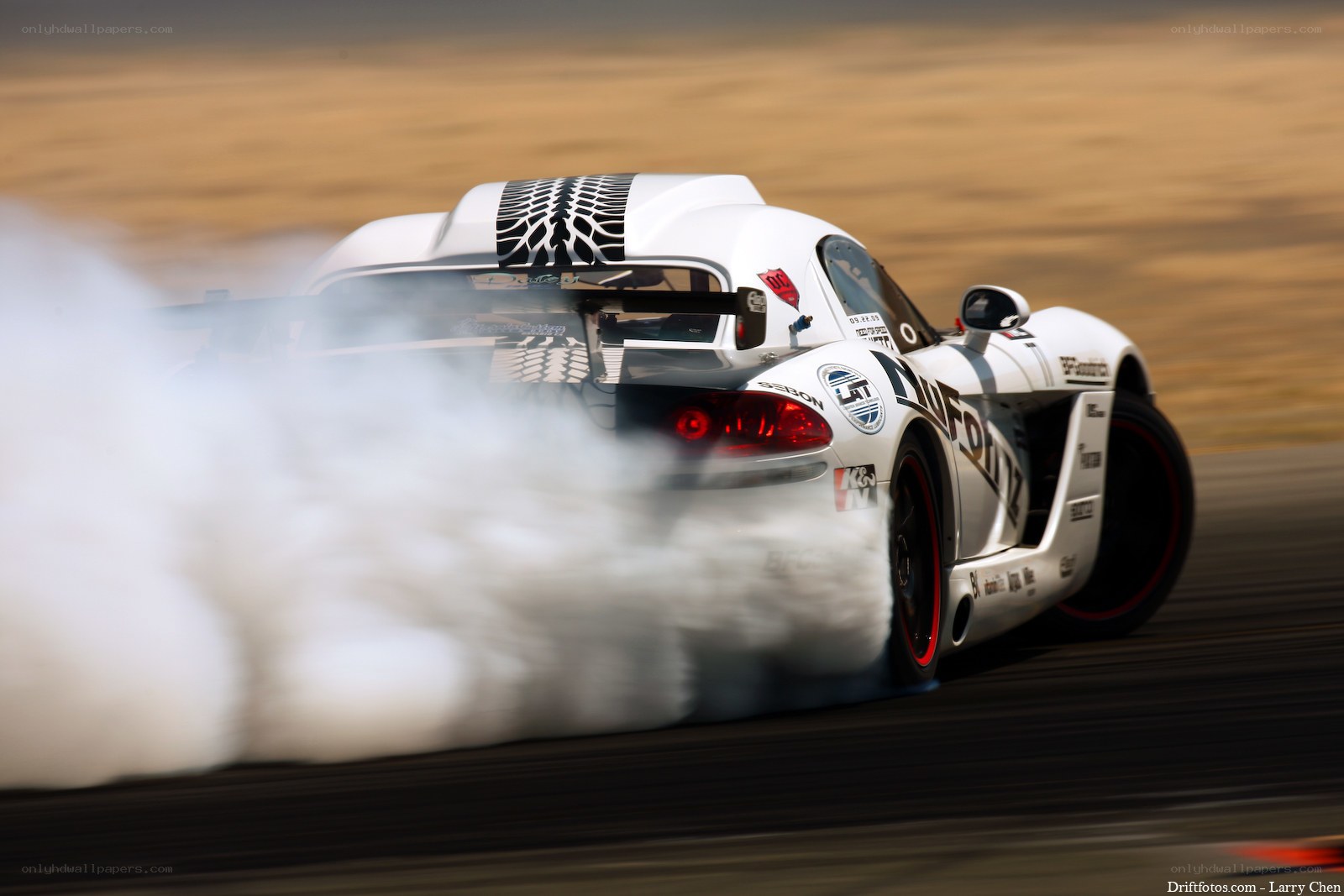 White race car drifting