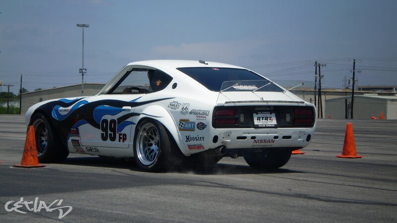 white race car drifting