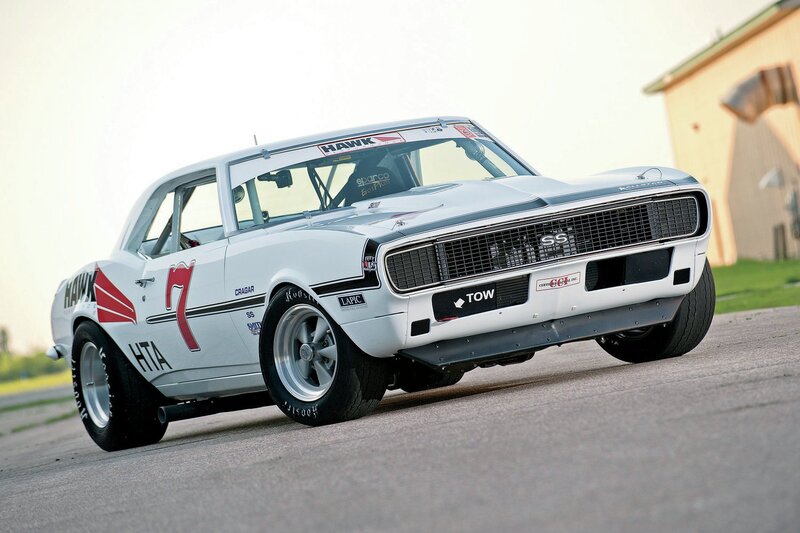 White Race Car — Dynamic, Afternoon, Photograph, Race Track, Building