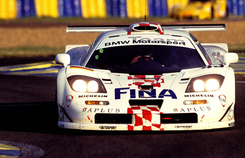 White Race Car — Dynamic, Afternoon, Photograph, Race Track, Driver, Safety Barrier, Blue