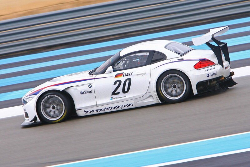 White Race Car — Dynamic, Afternoon, Photograph, Race Track, Tire, Wing, Blue