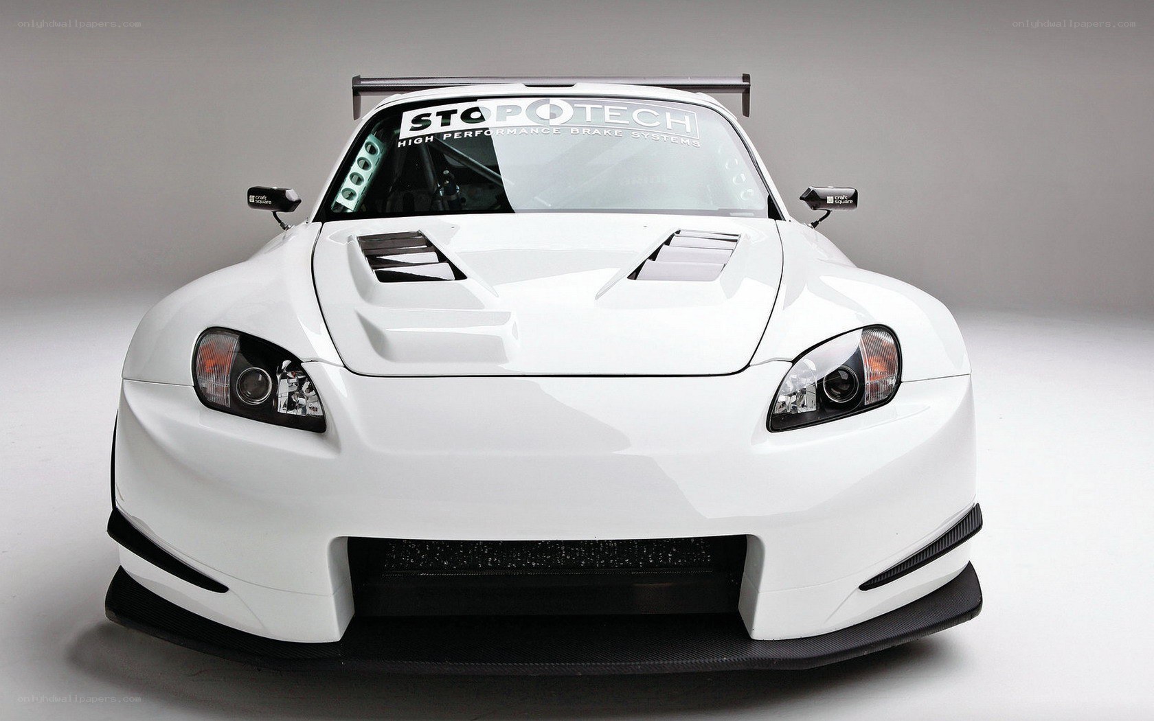 white race car front view