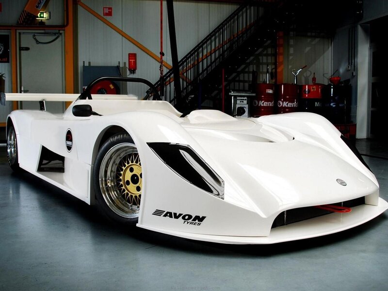 White race car in garage