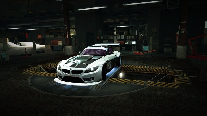 white race car in garage