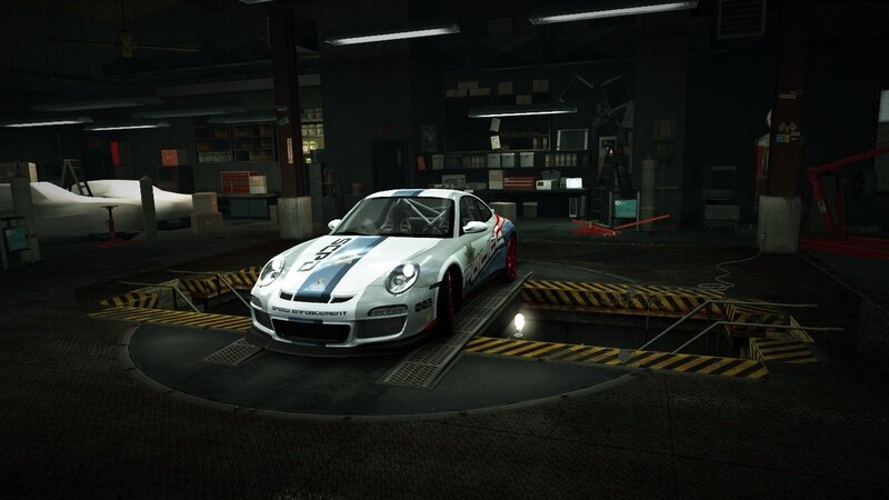 white race car in garage
