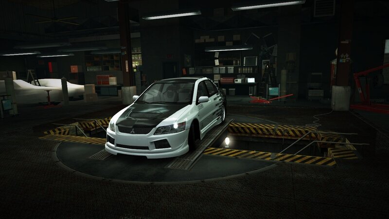white race car in garage