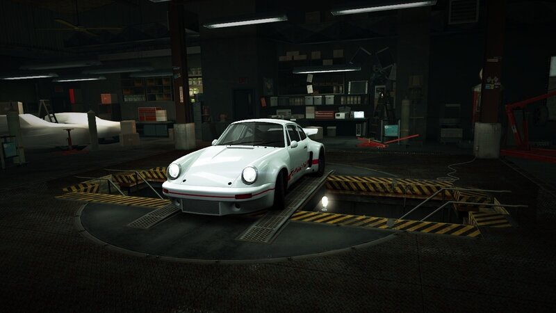 white race car in garage