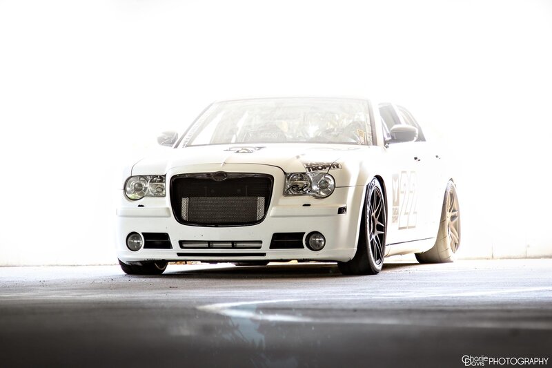 white race car in garage