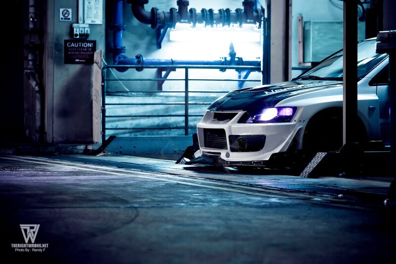 White race car in garage