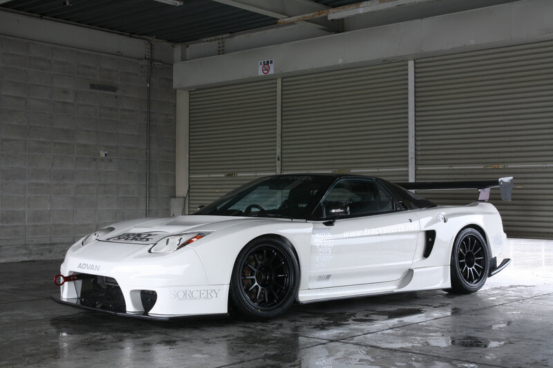 white race car in garage