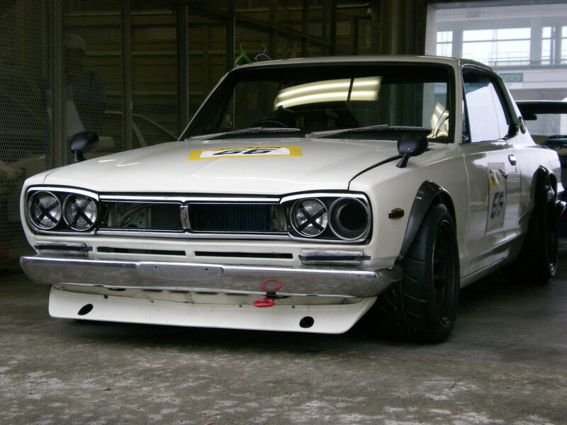 white race car in garage