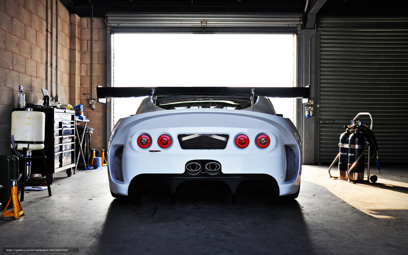 White Race Car in Garage — Dramatic