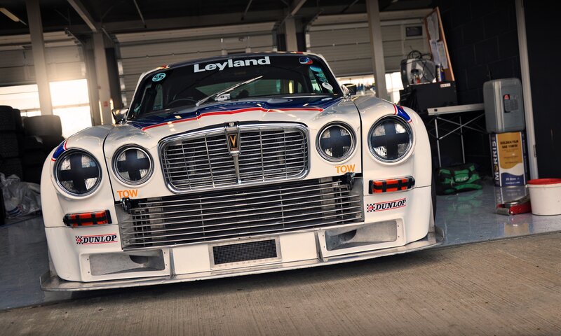 white race car in garage