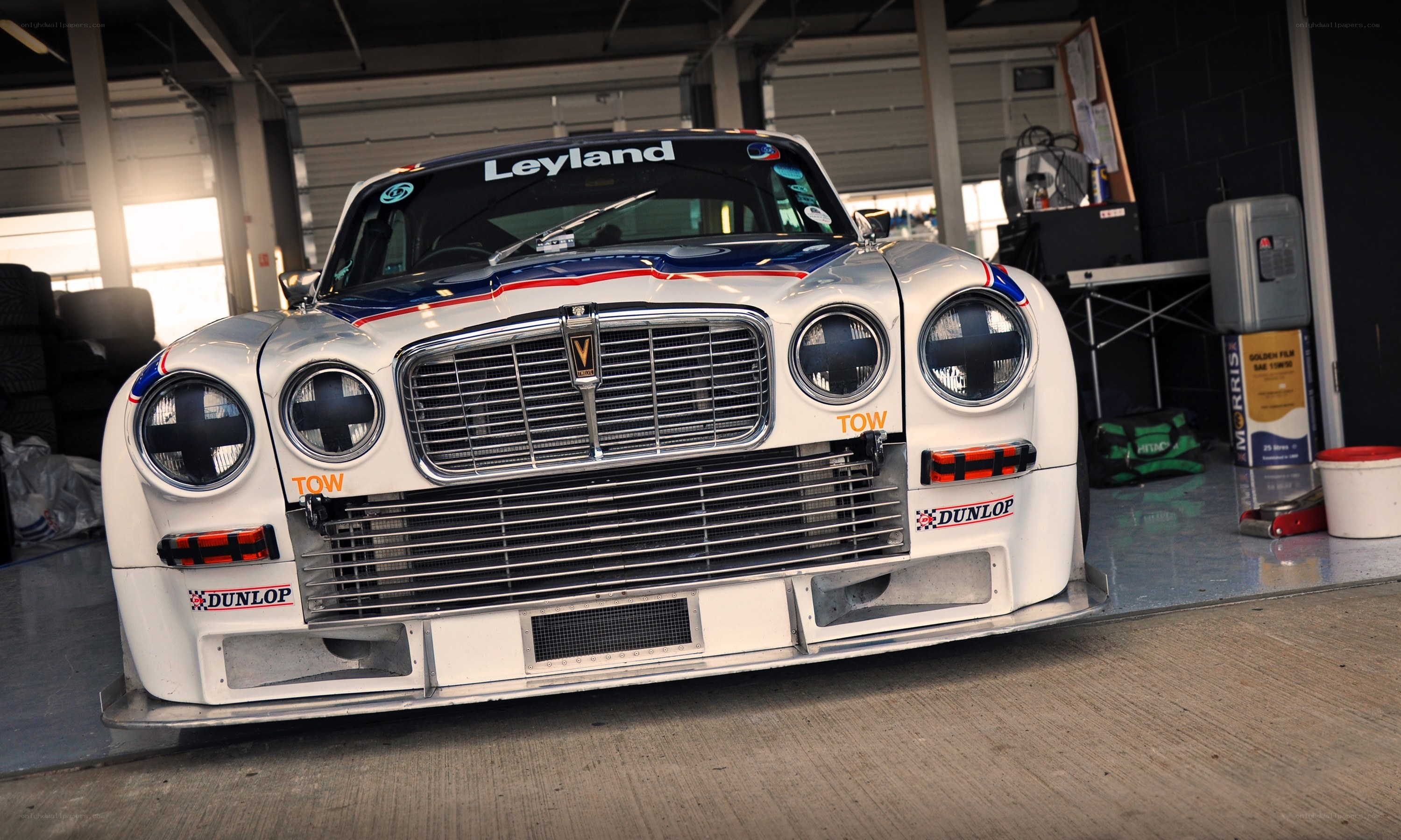 white race car in garage