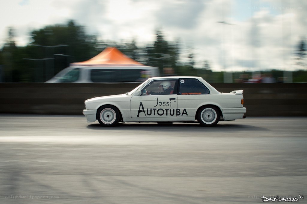 White race car in motion