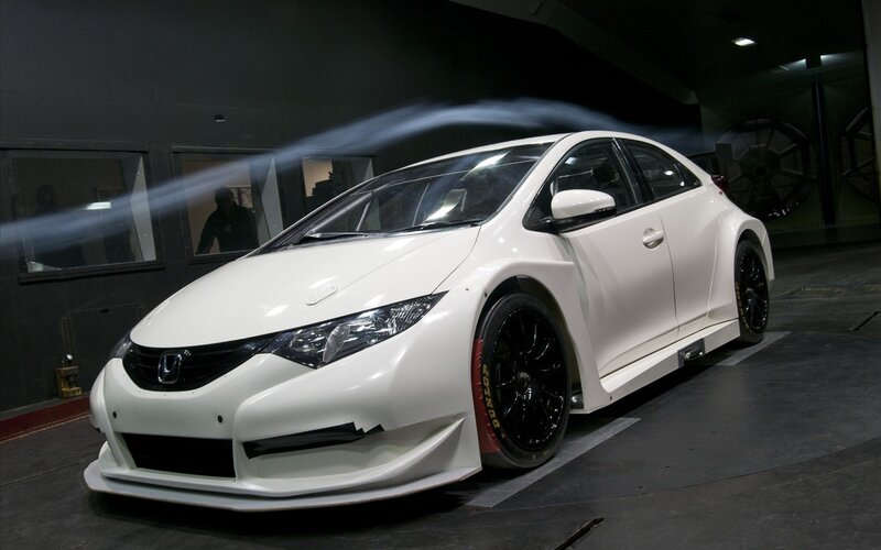 white race car in wind tunnel