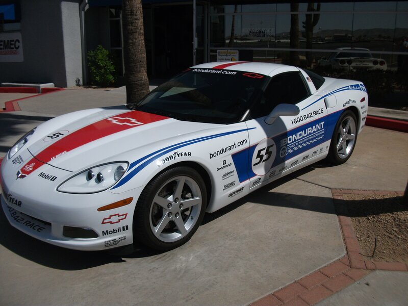 White Race Car — Neutral, Afternoon, Photograph, Building